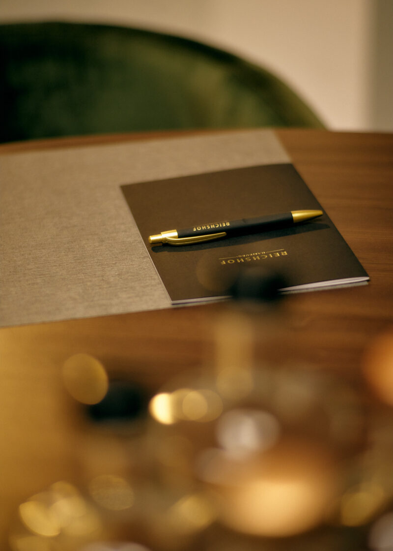 Meeting room with writing material set up